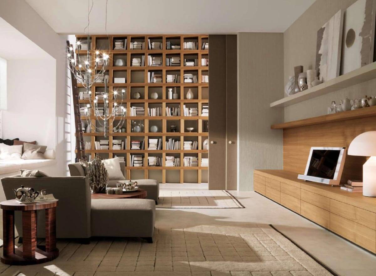 Aménagement intérieur de salon avec grande bibliothèque bois