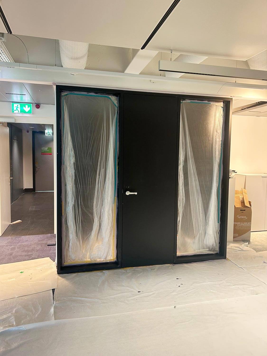 Chantier d'aménagement de bureaux d'entreprise à Lausanne par BeHome Interiors