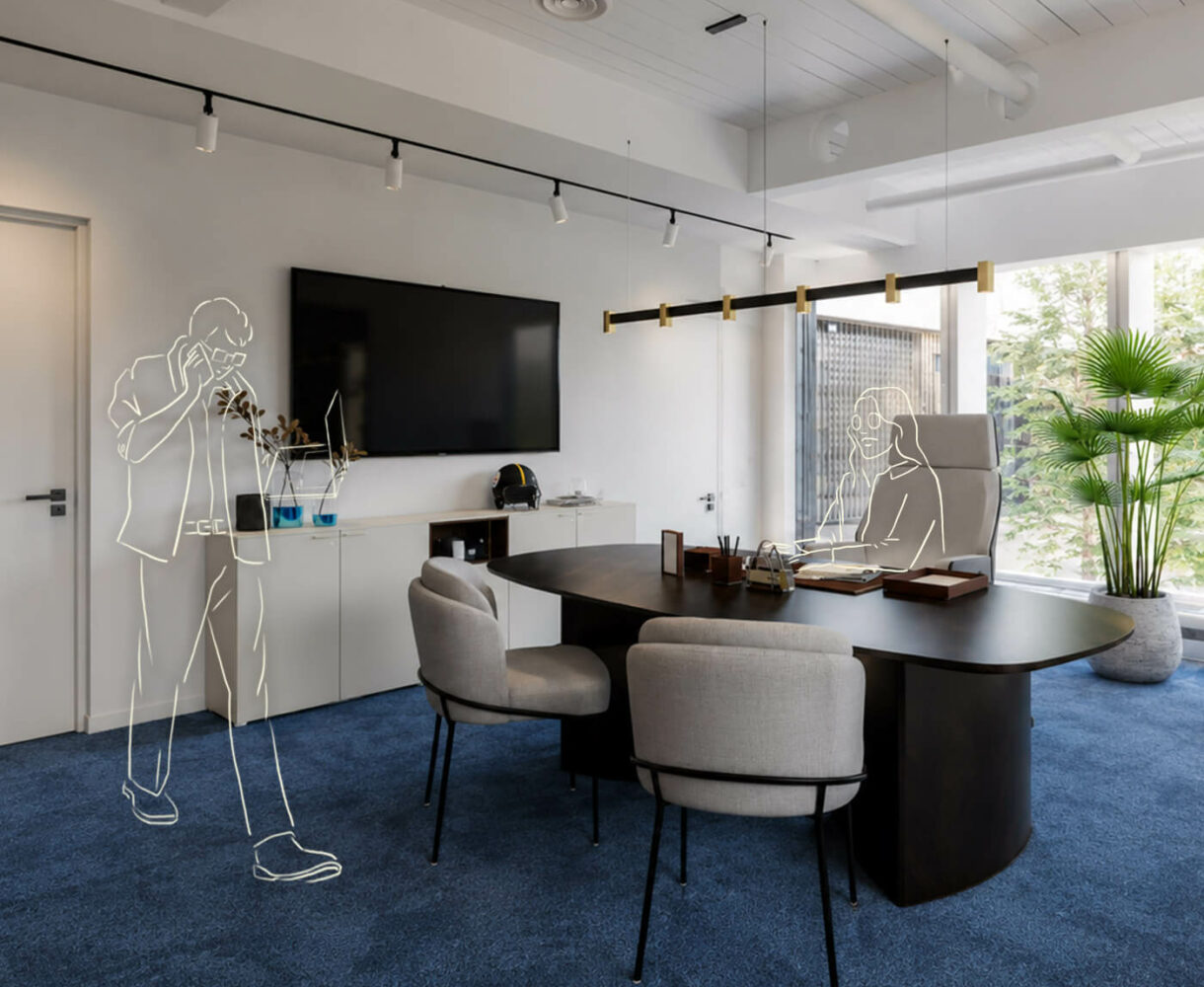 Bureau moderne avec table de réunion, écran mural, plantes